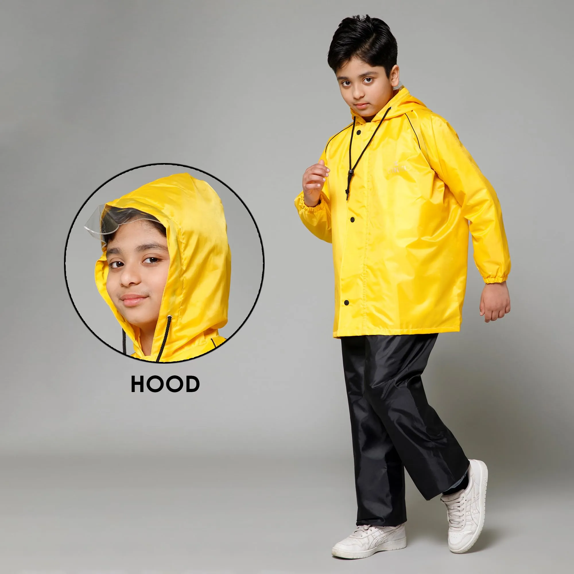THE CLOWNFISH Duke Series Kids Waterproof Polyester Double Coating Reversible Raincoat with Hood and Reflector Logo at Back. Set of Top and Bottom. Printed Plastic Pouch. Kid Age-11-13 years (Yellow)