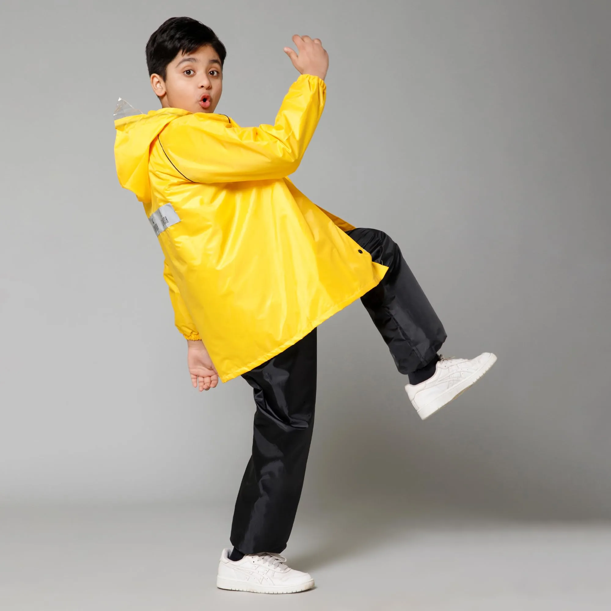 THE CLOWNFISH Duke Series Kids Waterproof Polyester Double Coating Reversible Raincoat with Hood and Reflector Logo at Back. Set of Top and Bottom. Printed Plastic Pouch. Kid Age-11-13 years (Yellow)