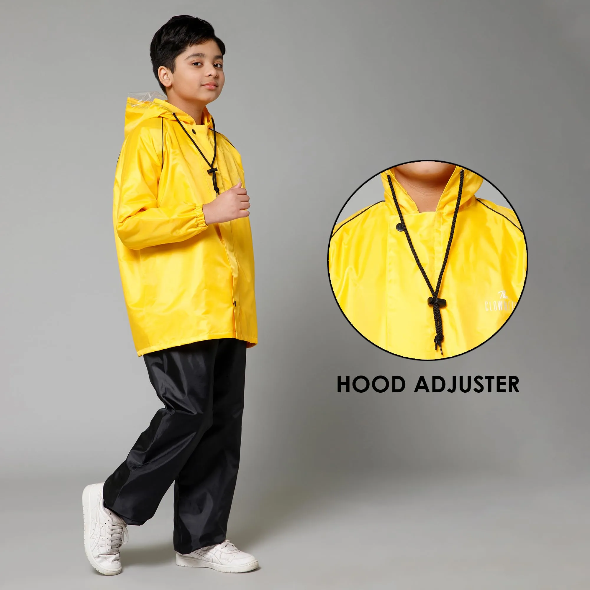 THE CLOWNFISH Duke Series Kids Waterproof Polyester Double Coating Reversible Raincoat with Hood and Reflector Logo at Back. Set of Top and Bottom. Printed Plastic Pouch. Kid Age-11-13 years (Yellow)