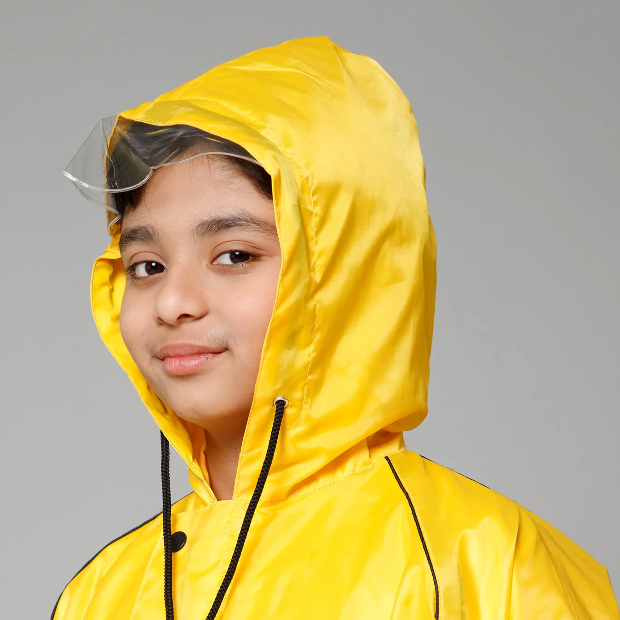 THE CLOWNFISH Duke Series Kids Waterproof Polyester Double Coating Reversible Raincoat with Hood and Reflector Logo at Back. Set of Top and Bottom. Printed Plastic Pouch. Kid Age-11-13 years (Yellow)