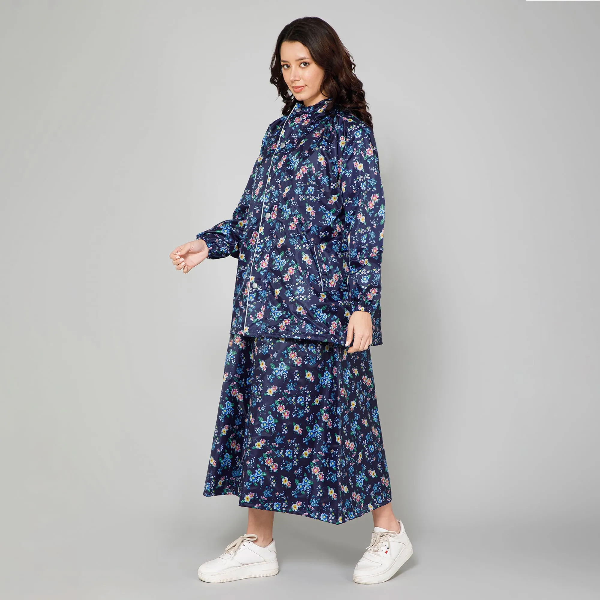 THE CLOWNFISH Polyester Waterproof Rain Coat For Women Skirt and Top Raincoat With Adjustable Hood and Front Pockets Rain Glam Series (Dark Blue Floral, X-Large)