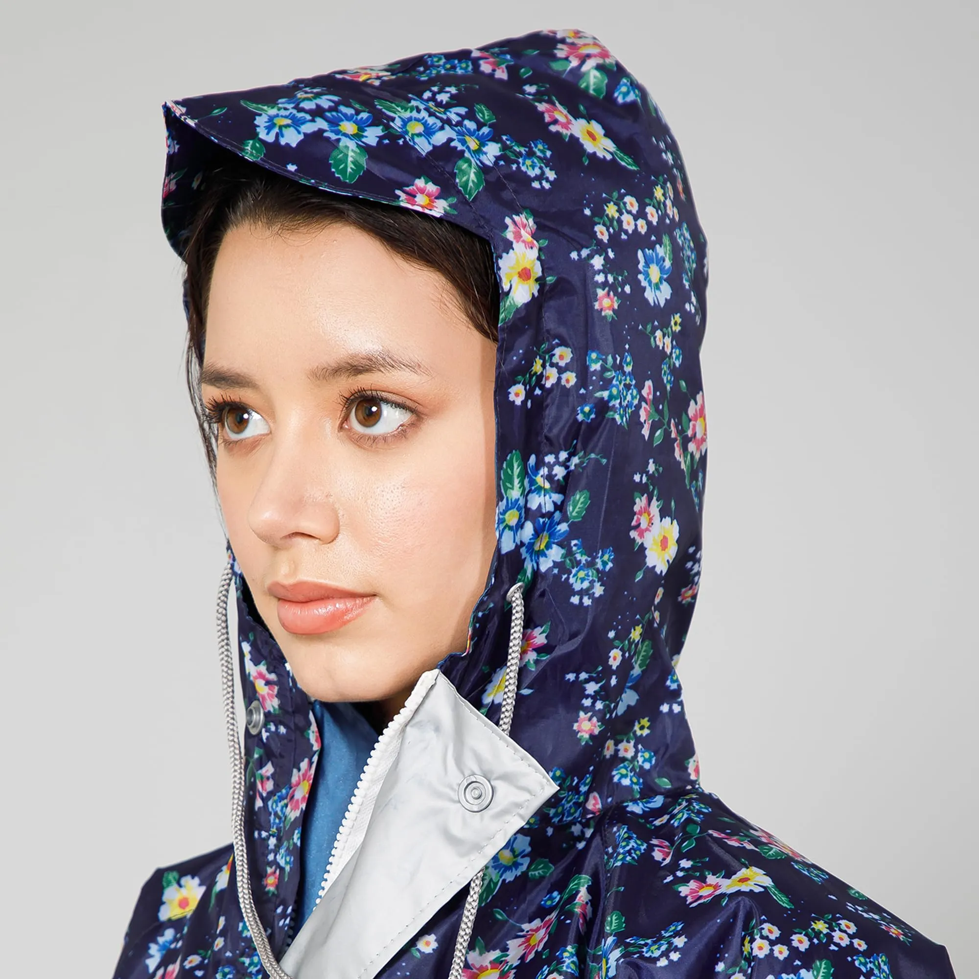 THE CLOWNFISH Polyester Waterproof Rain Coat For Women Skirt and Top Raincoat With Adjustable Hood and Front Pockets Rain Glam Series (Dark Blue Floral, X-Large)