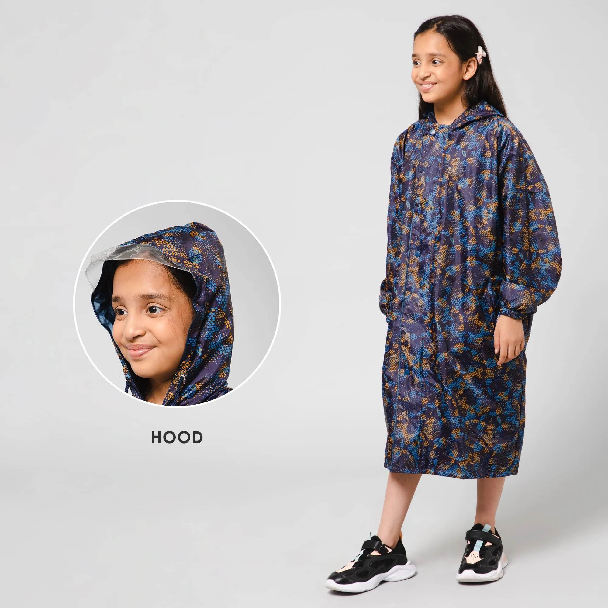 THE CLOWNFISH Splash Squad Series Kids Raincoat Waterproof Polyester Double Coating Reversible Longcoat with Hood and Reflector Logo at Back. Printed Plastic Pouch. Kid Age-7-8 years (Midnight Blue)