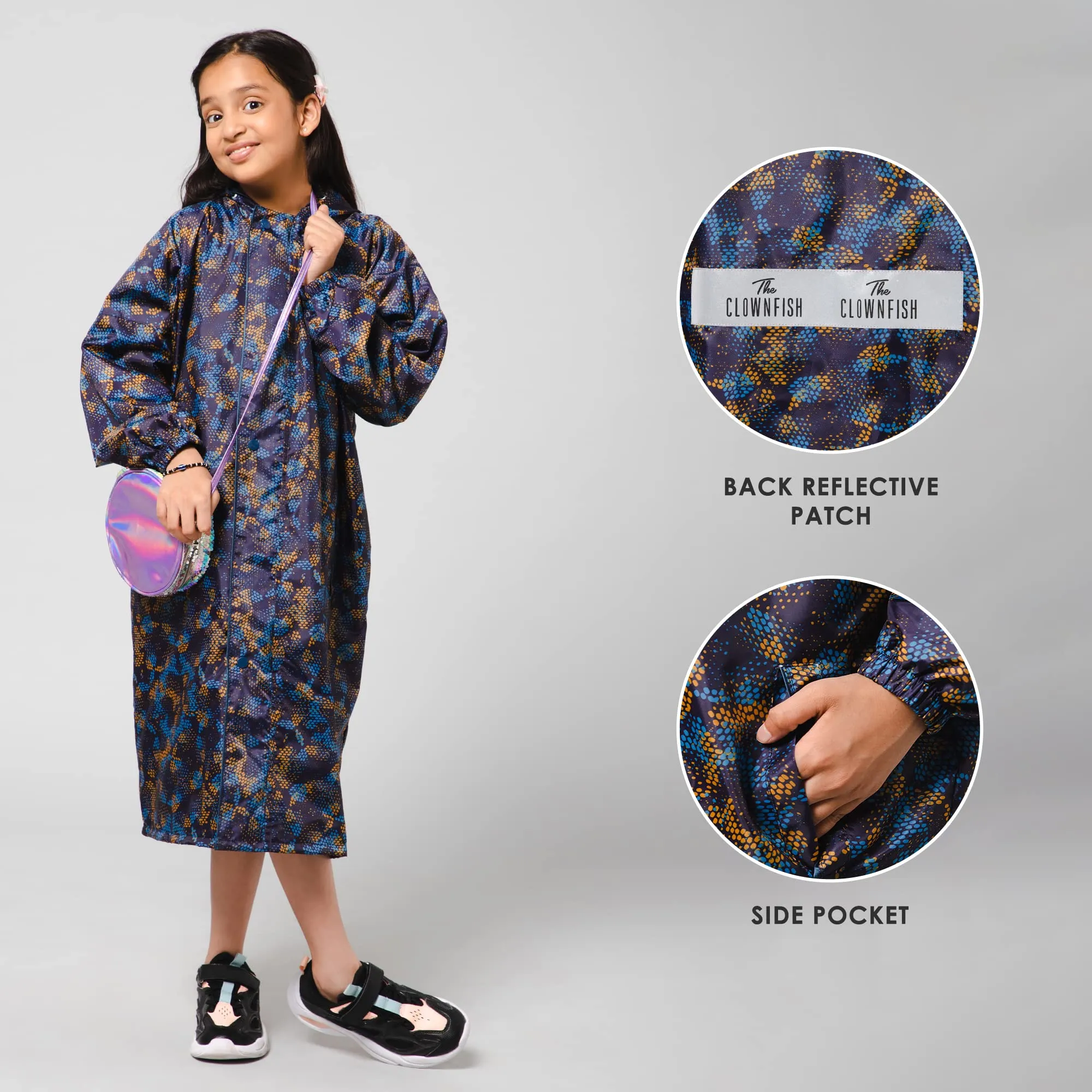 THE CLOWNFISH Splash Squad Series Kids Raincoat Waterproof Polyester Double Coating Reversible Longcoat with Hood and Reflector Logo at Back. Printed Plastic Pouch. Kid Age-7-8 years (Midnight Blue)