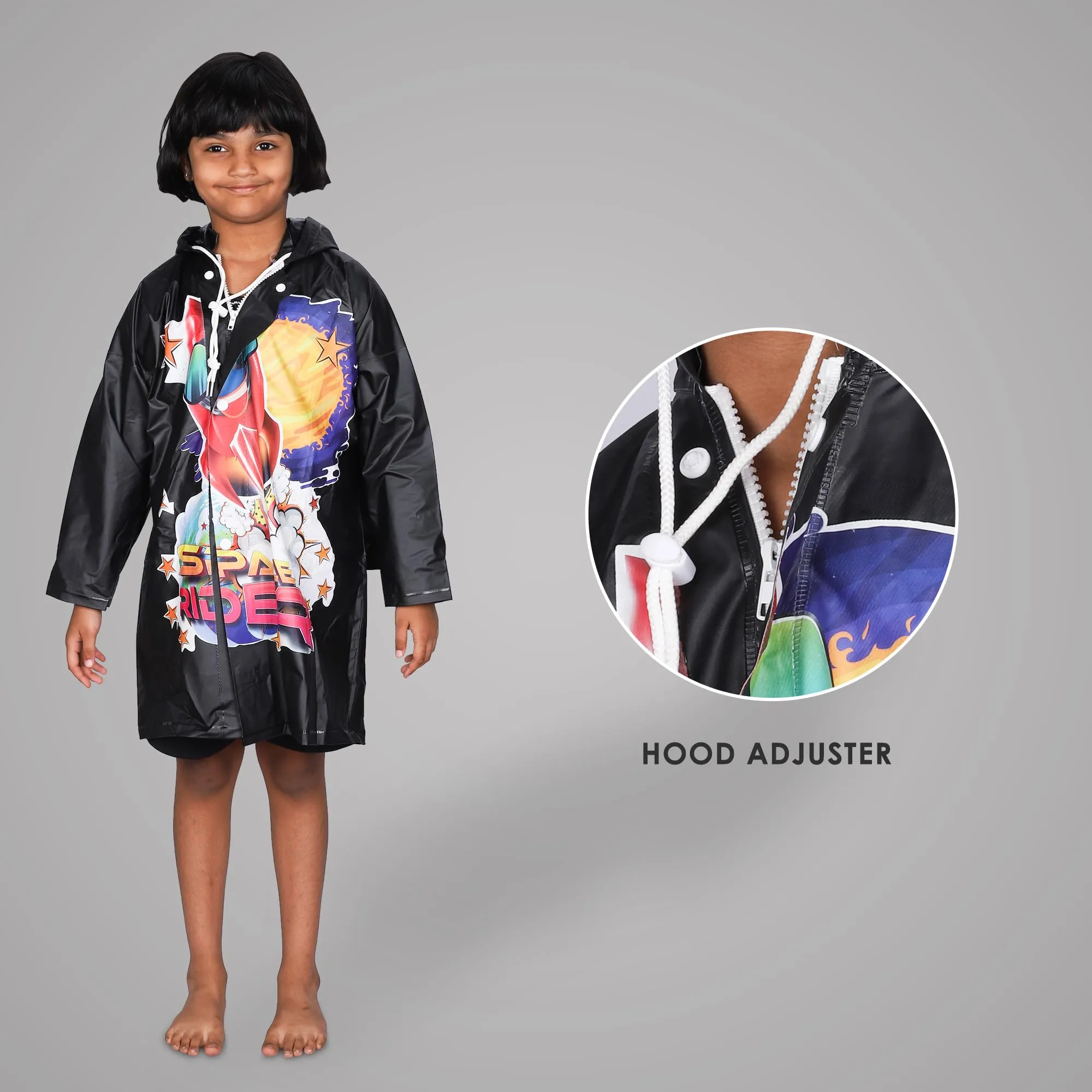 THE CLOWNFISH Toon Caper Series Kids Waterproof PVC Longcoat with Adjustable Hood & Extra Space for Backpack/Schoolbag Holding. Printed Plastic Pouch. Kid Age-6-7 years (Black)