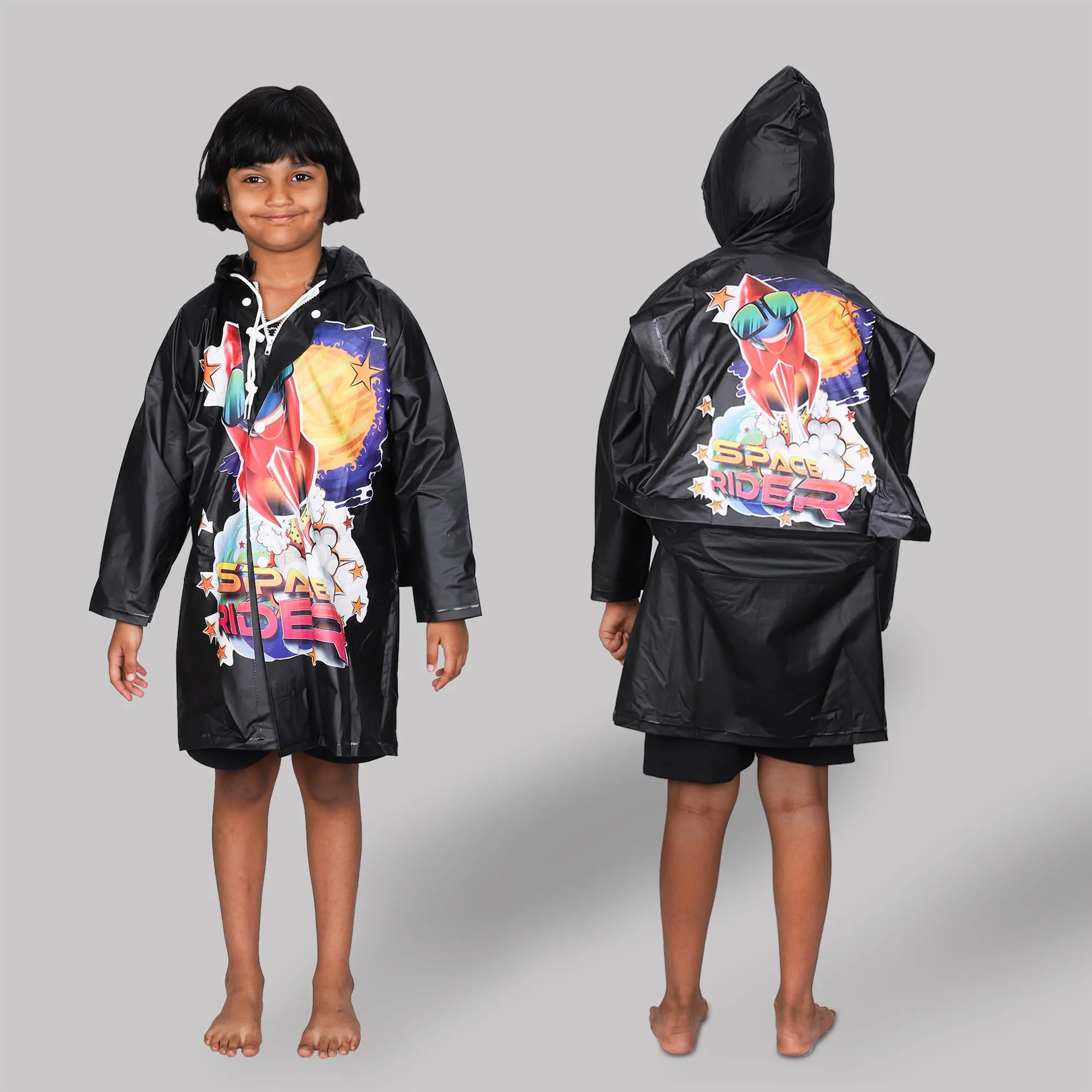 THE CLOWNFISH Toon Caper Series Kids Waterproof PVC Longcoat with Adjustable Hood & Extra Space for Backpack/Schoolbag Holding. Printed Plastic Pouch. Kid Age-6-7 years (Black)