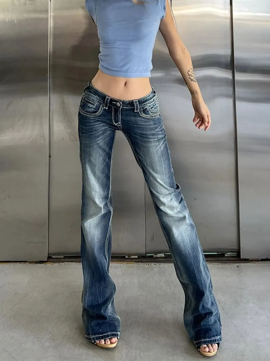 Wenkouban 90s blue low waist flared trousers with washed effect